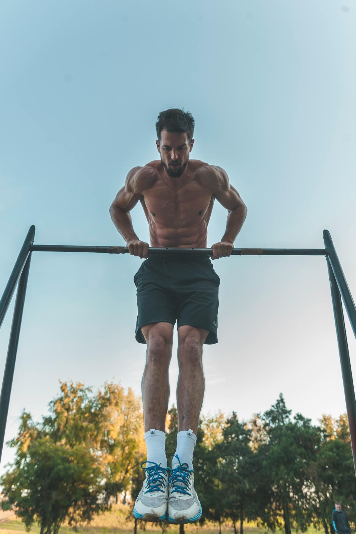 Man training outdoors with discipline and strength